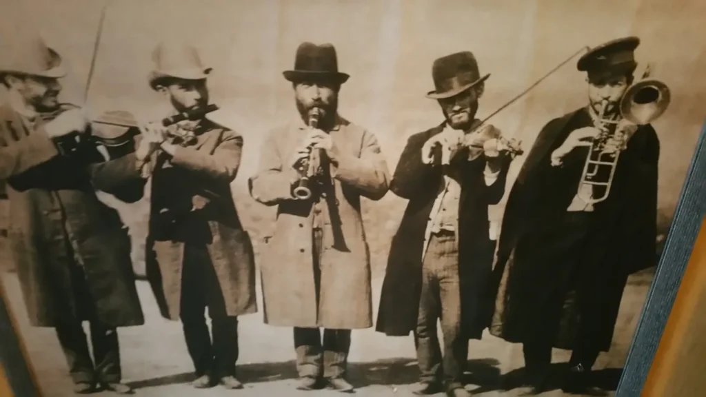 Krakow - Picture of Chasidic looking Jews playing music inside the Klezmer Hoise.