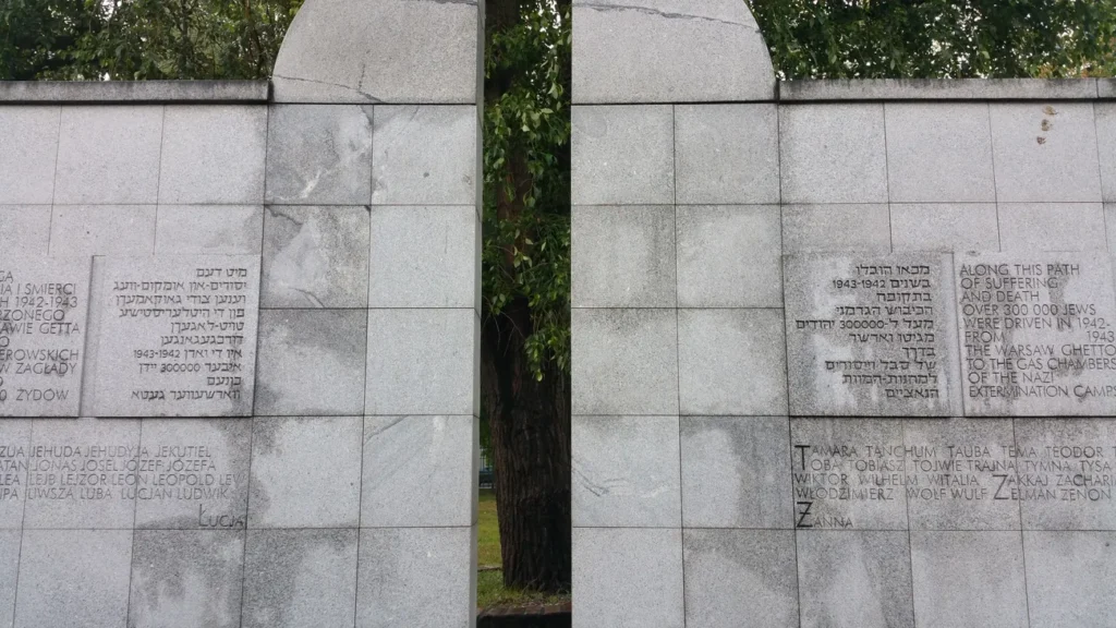 Warsaw - Umschlagplatz Memorial.  The author stepped through the crack in the wall to see the large space on the other side.